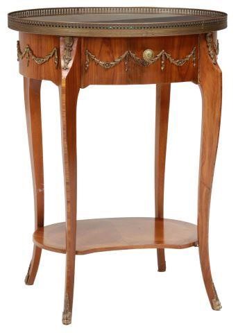 Appraisal: French Louis XV style glass-top mahogany side table th c