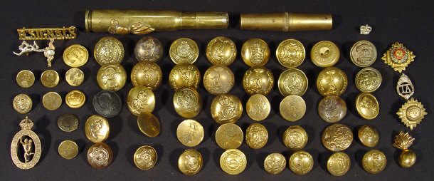 Appraisal: Collection of military brass pips and buttons together with a