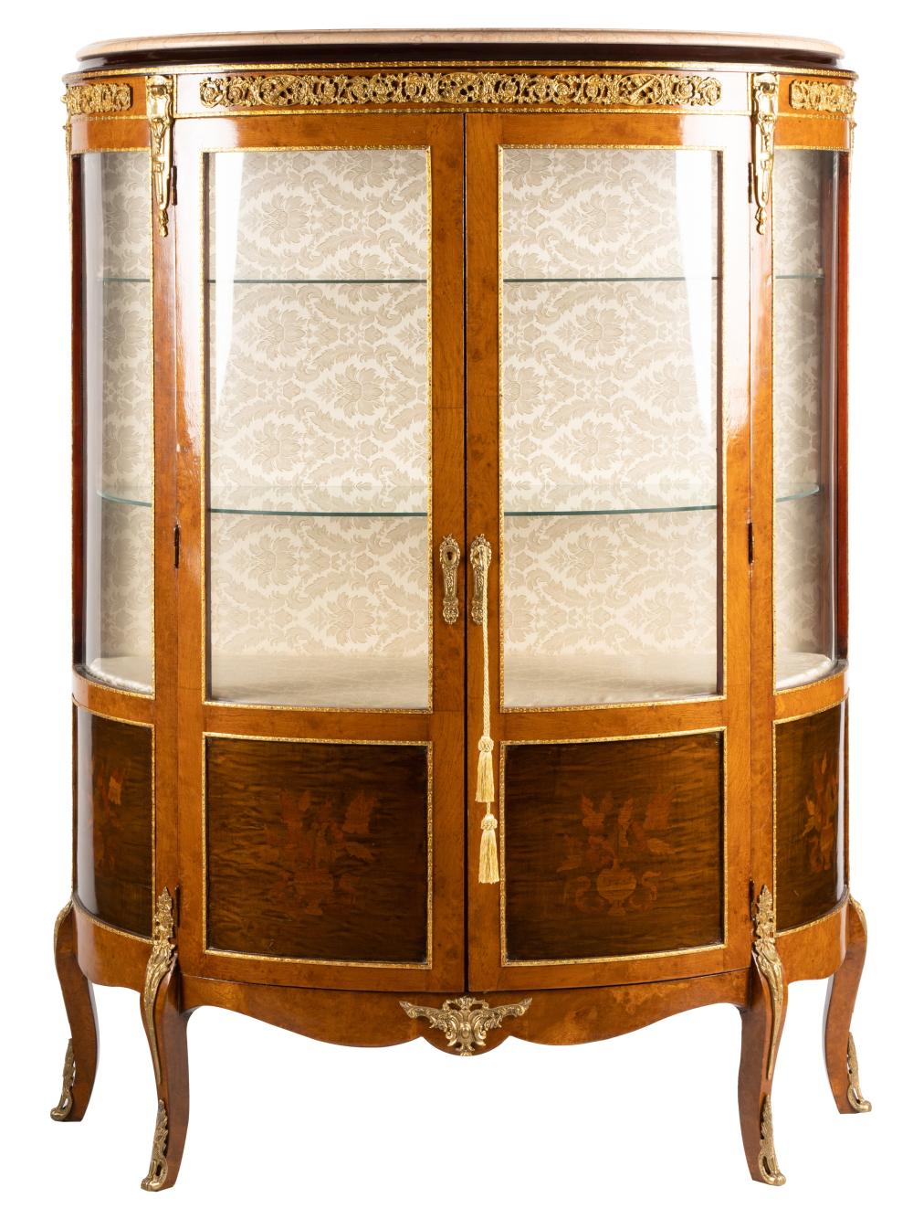 Appraisal: GILT METAL-MOUNTED DEMILUNE VITRINE CABINEThaving a removable marble top over