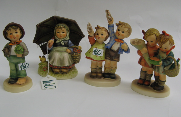 Appraisal: FOUR GERMAN HUMMEL FIGURINES Smiling Through HUM - H TM-