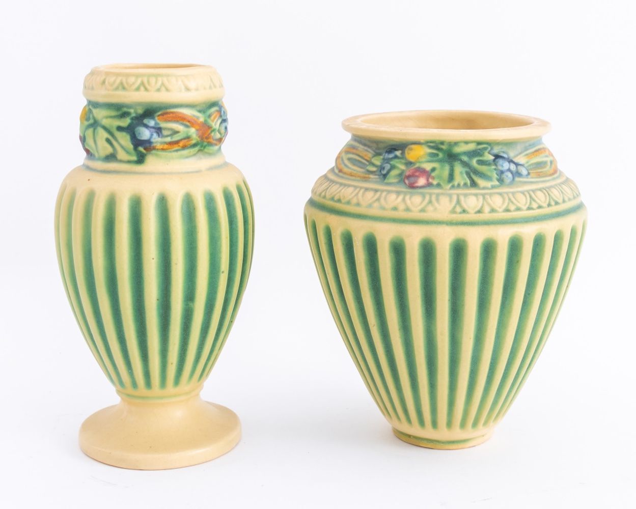 Appraisal: ROSEVILLE POTTERY CORINTHIAN VASES Roseville Pottery polychrome ceramic Corinthian pattern