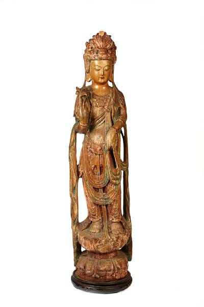 Appraisal: A large carved wood standing Guanyin Late Qing Republic Period