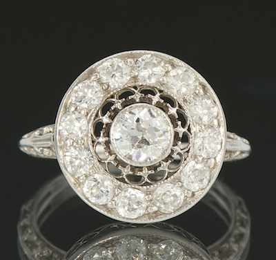 Appraisal: A Ladies' Platinum and Diamond Ring Platinum ring with round