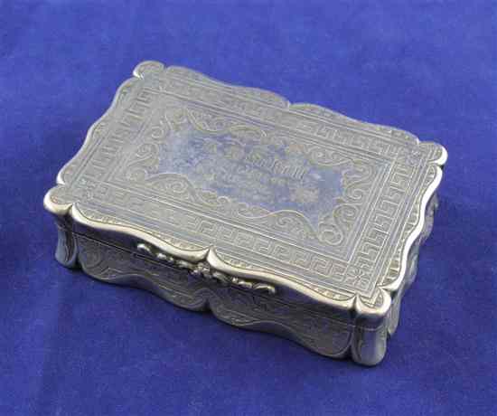 Appraisal: A Victorian silver table snuff box of shaped rectangular form