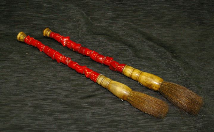 Appraisal: Pair of Chinese Scarlet-Tinted Marble Nugget and Bone Calligrapher's Brushes