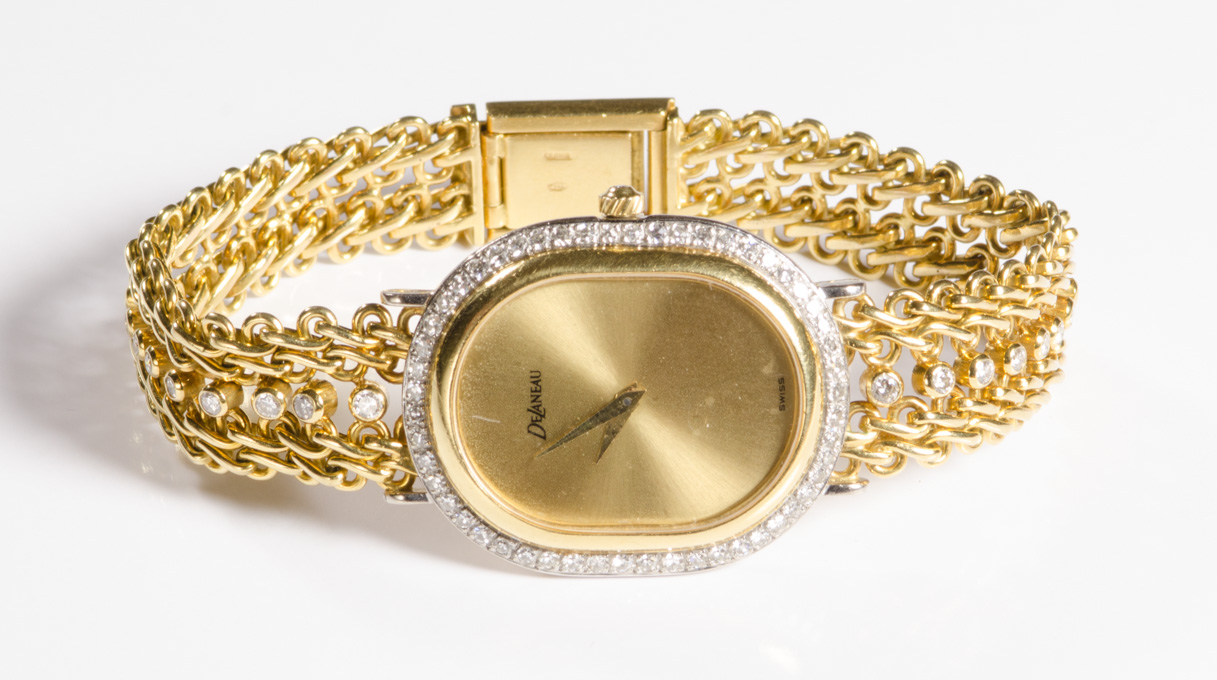 Appraisal: SWISS DeLANEAU DIAMOND AND EIGHTEEN KARAT GOLD BRACELET WRIST WATCH