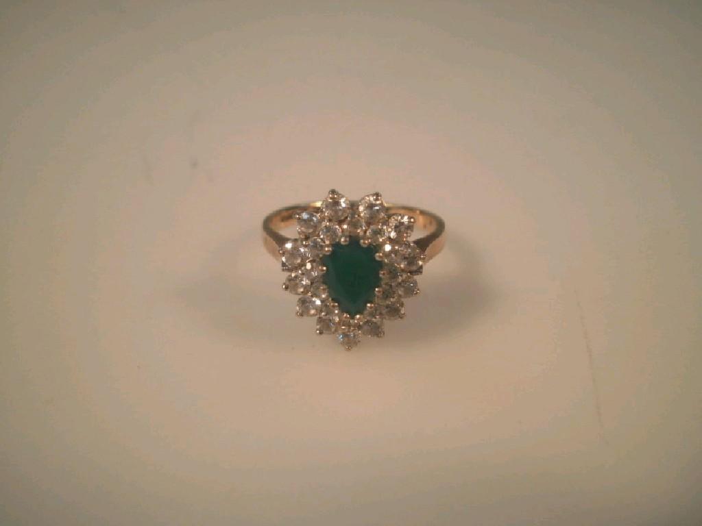 Appraisal: A green stone and C Z tear drop cluster ring