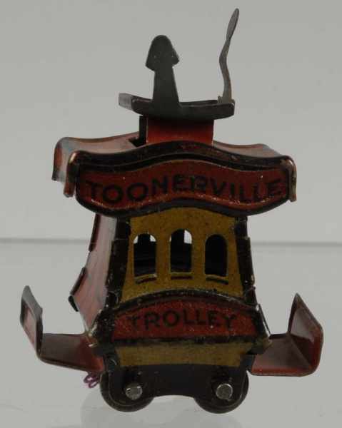 Appraisal: Tin Cracker Jack Toonerville Trolley Toy Description Marked Copyright by