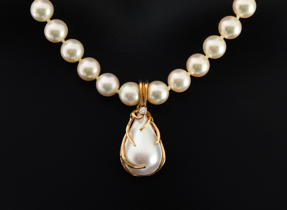 Appraisal: AKOYA PEARL NECKLACE WITH ENHANCER AND RING '' strand of