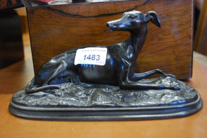 Appraisal: A bronze spelter figure of a recumbent Whippet cm