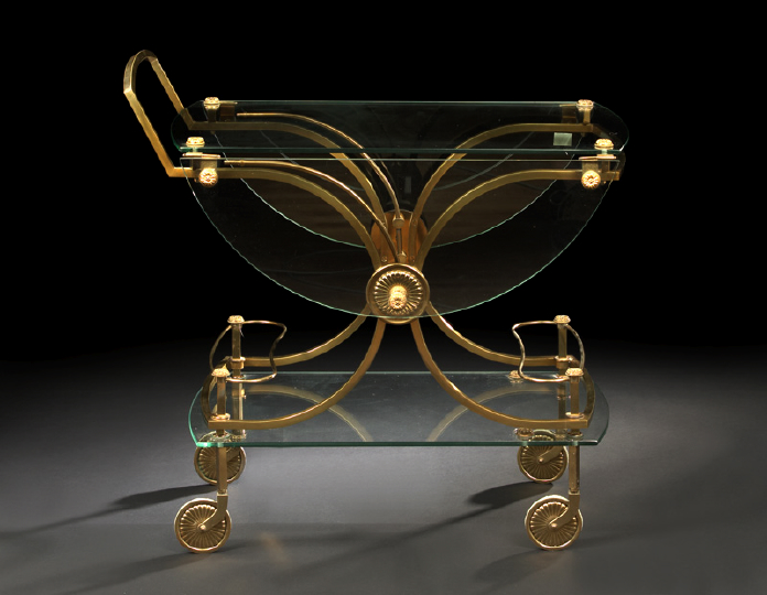 Appraisal: French Brushed Brass and Glass Tea Trolley in the Louis