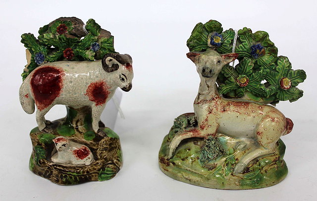 Appraisal: A GEORGE III STAFFORDSHIRE POTTERY FIGURE of a ram with