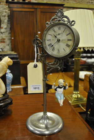 Appraisal: A late th century Ansonia novelty mantel clock the drum