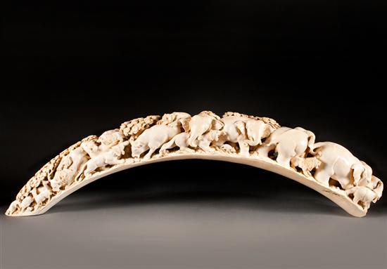 Appraisal: Chinese elaborately carved ivory animal bridge th th century comprising