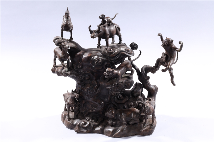 Appraisal: Chinese bronze dragon and animal group sculpture x x approx