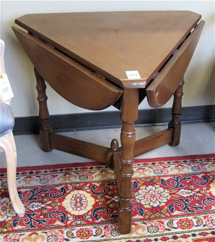 Appraisal: TRIANGULAR DROP-LEAF TEA TABLE American early th century the triangular