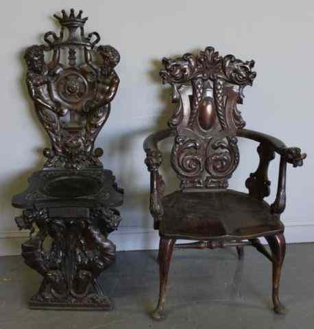 Appraisal: Two Highly Carved Chairs As is with splits to wood