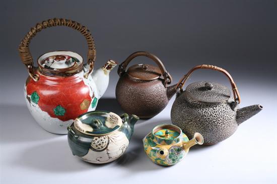 Appraisal: FIVE JAPANESE PORCELAIN TEAPOTS Two brown-glazed one green brown and