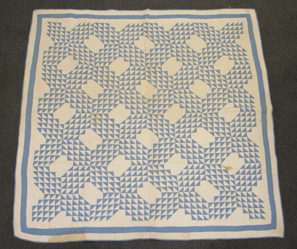 Appraisal: Blue and white hand stitched quilt with migrating geese Provenance