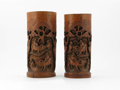 Appraisal: A pair of Chinese bamboo cylindrical vases carved with figures