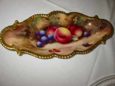 Appraisal: A ROYAL WORCESTER PORCELAIN DISH of shaped oval form painted