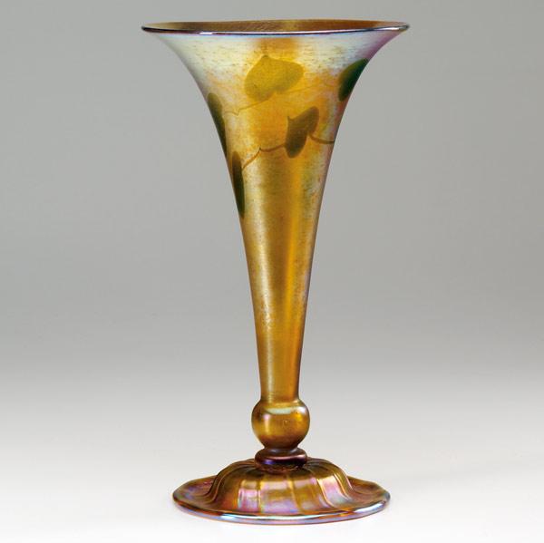 Appraisal: TIFFANY STUDIOS Gold Favrile trumpet vase with green heart-and-vine decoration