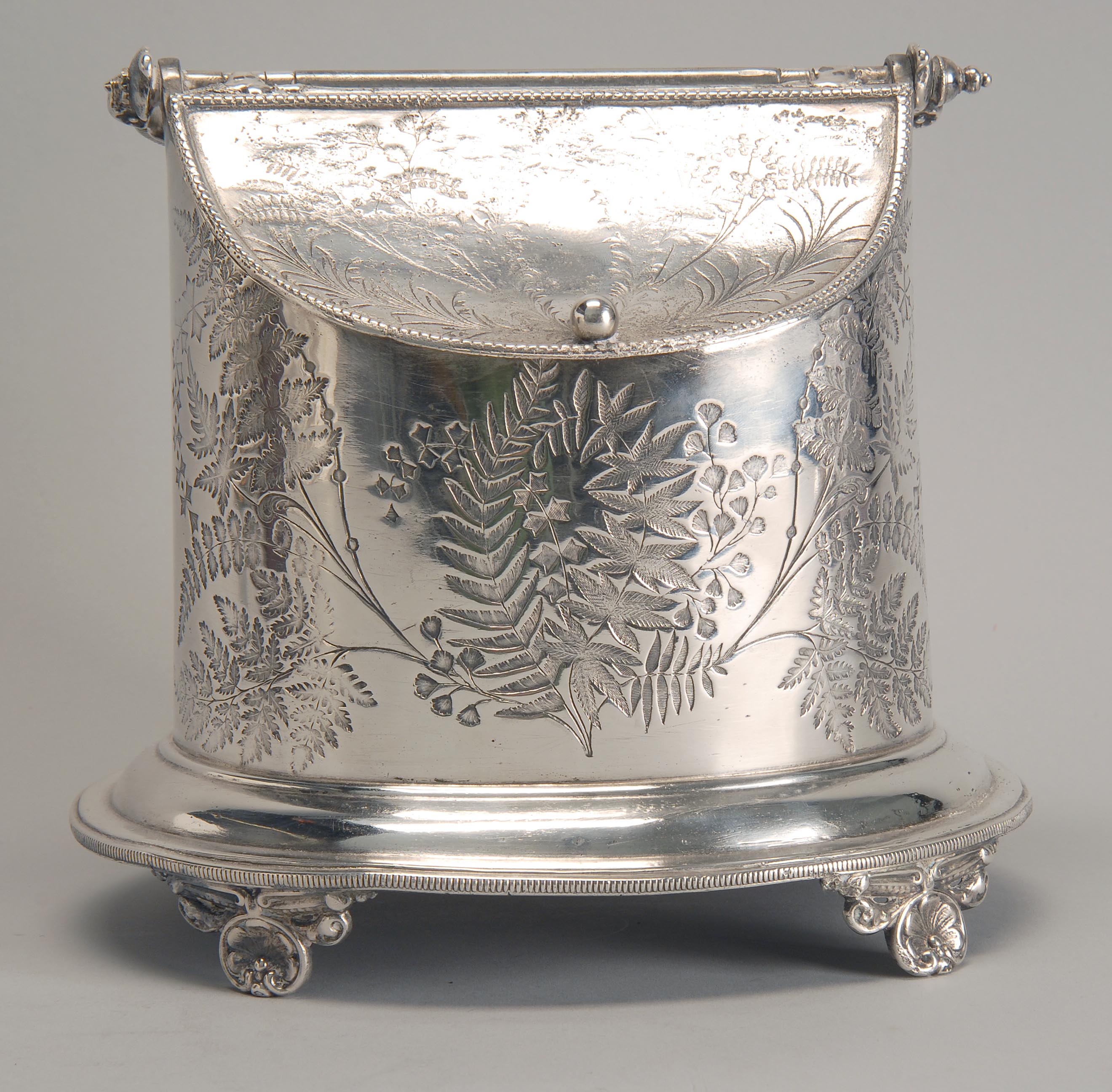 Appraisal: SILVER PLATED TWO-SIDED CADDY in oval form on footed base