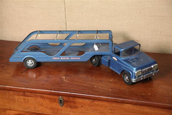 Appraisal: TONKA TRUCK AND TRAILER Blue pressed steel body with plastic