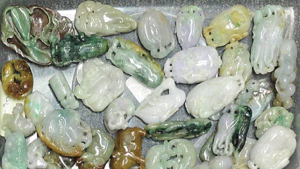 Appraisal: A group of small jadeite carvings Including thirteen carvings with