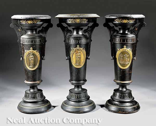 Appraisal: Three American Aesthetic Ebonized Incised Gilt and Paint-Decorated Bronze-Mounted Pedestals