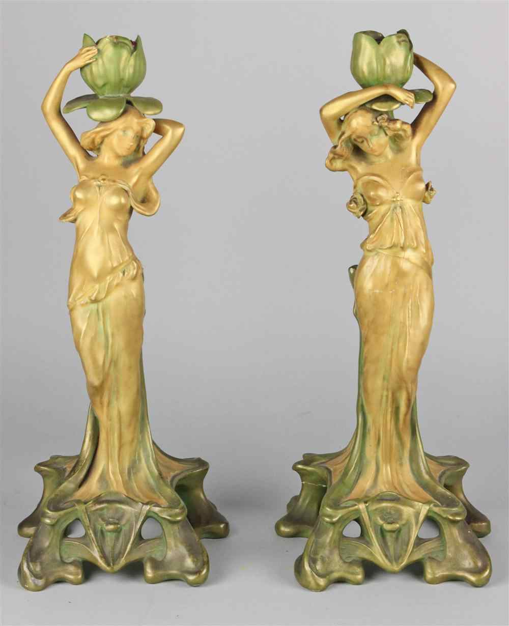 Appraisal: PAIR OF AUSTRIAN ART NOUVEAU FIGURAL CANDLE HOLDERS late th