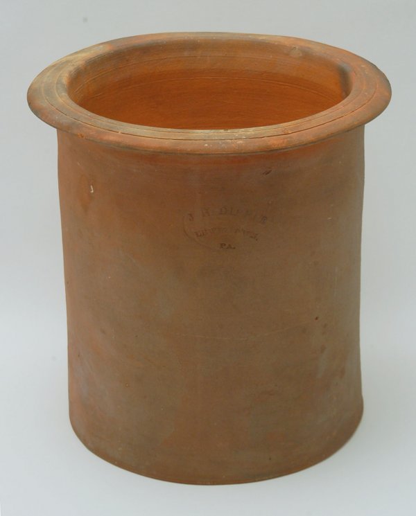 Appraisal: Redware chimney collar cylindrical in shape with flared flat rim