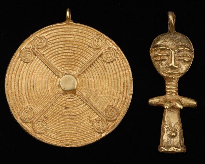 Appraisal: TWO AFRICAN-STYLE PENDANTS stamped k in Provenance Property from the