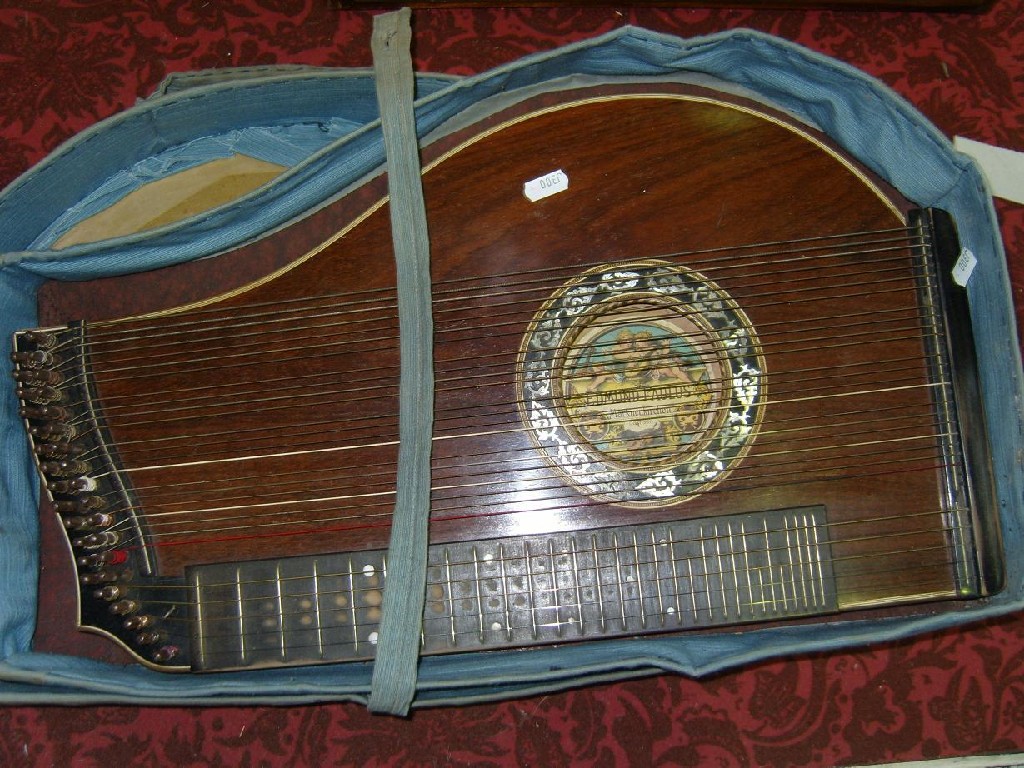 Appraisal: A cased early th century zither with mother of pearl