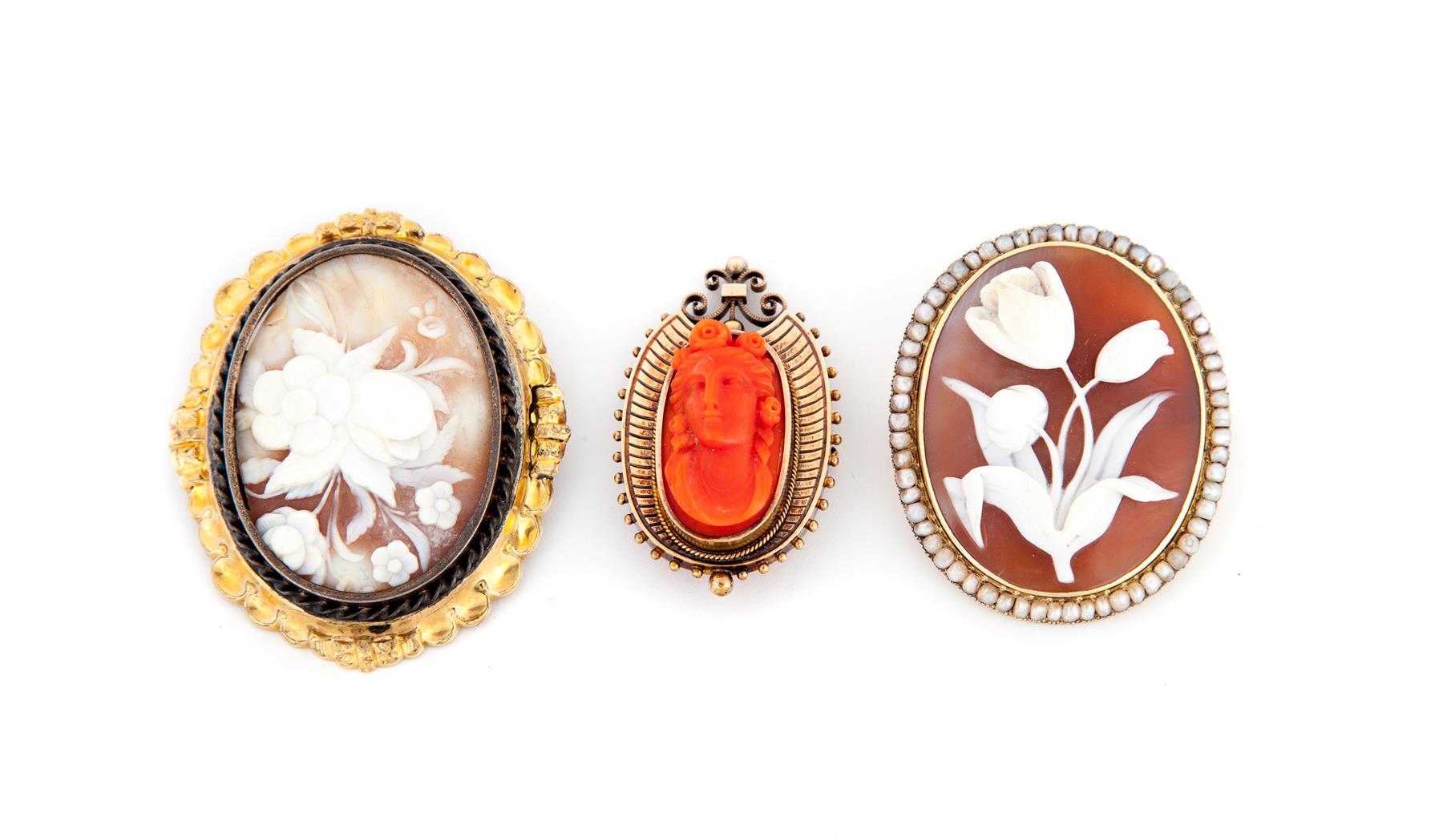 Appraisal: THREE CAMEO BROOCHES American early th century Round carved shell