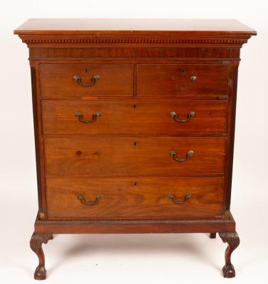 Appraisal: A George II mahogany chest the dentil cornice above two