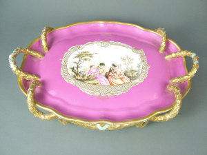 Appraisal: Meissen pink ground tray raised on four feet the central