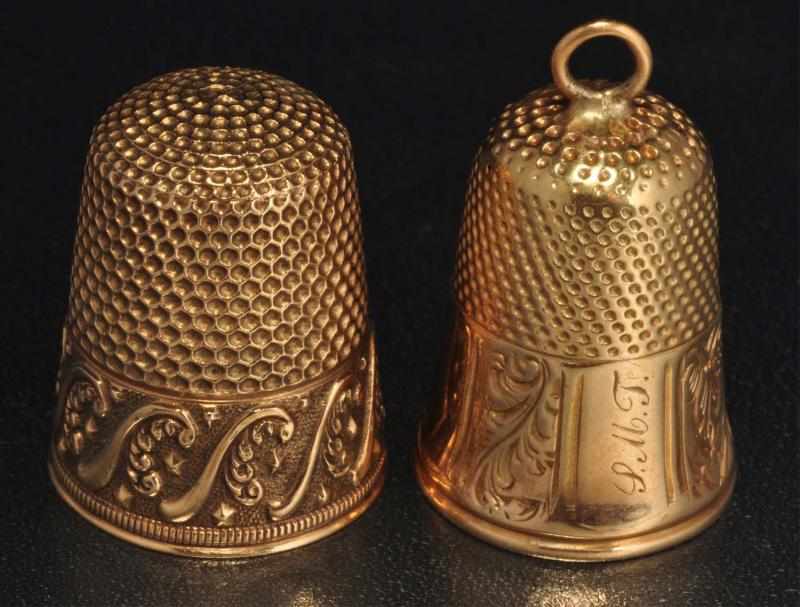 Appraisal: Lot of K Y Gold Thimble Charms Description Weight dwt