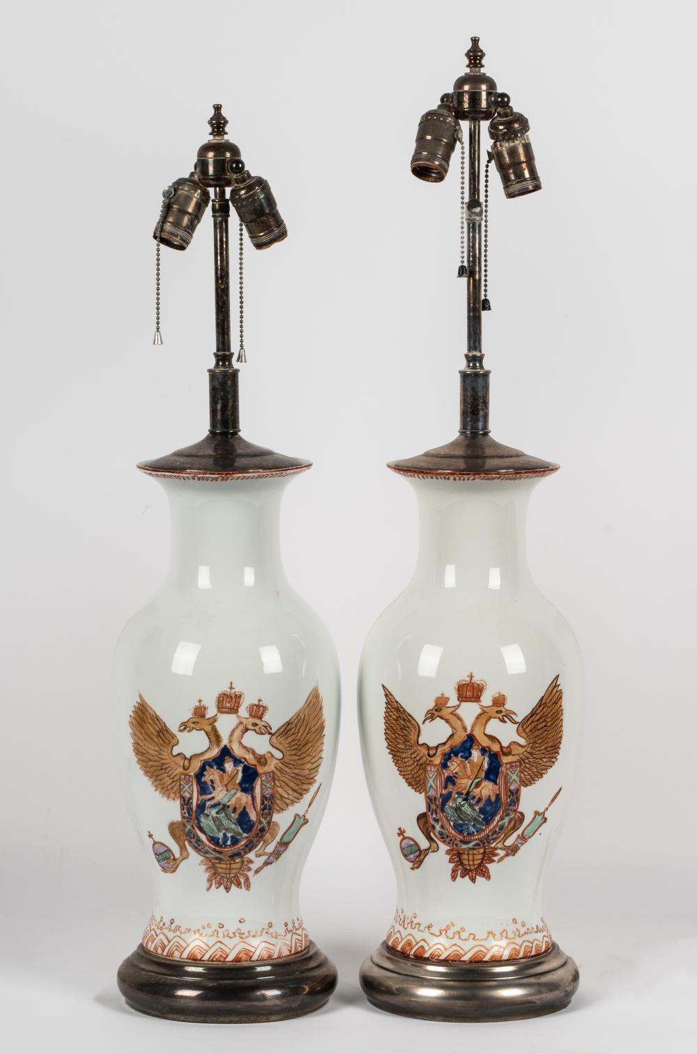 Appraisal: PAIR OF CHINESE EXPORT-STYLE PORCELAIN VASESwith hand-painted crest front and