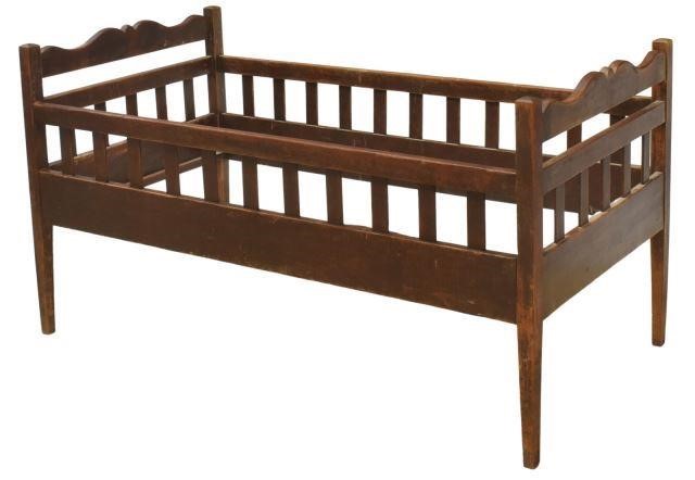 Appraisal: American Primitive oak child's bed Texas c s having shaped