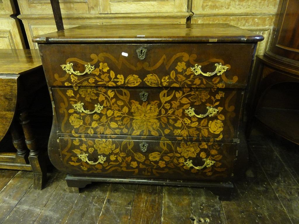 Appraisal: A th century Dutch floral marquetry bombe commode fitted with