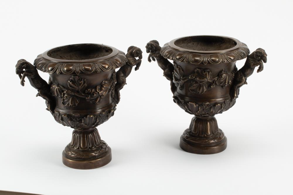 Appraisal: Pair of Pompeian-Style Bronze Vases ram handles foliate decoration h