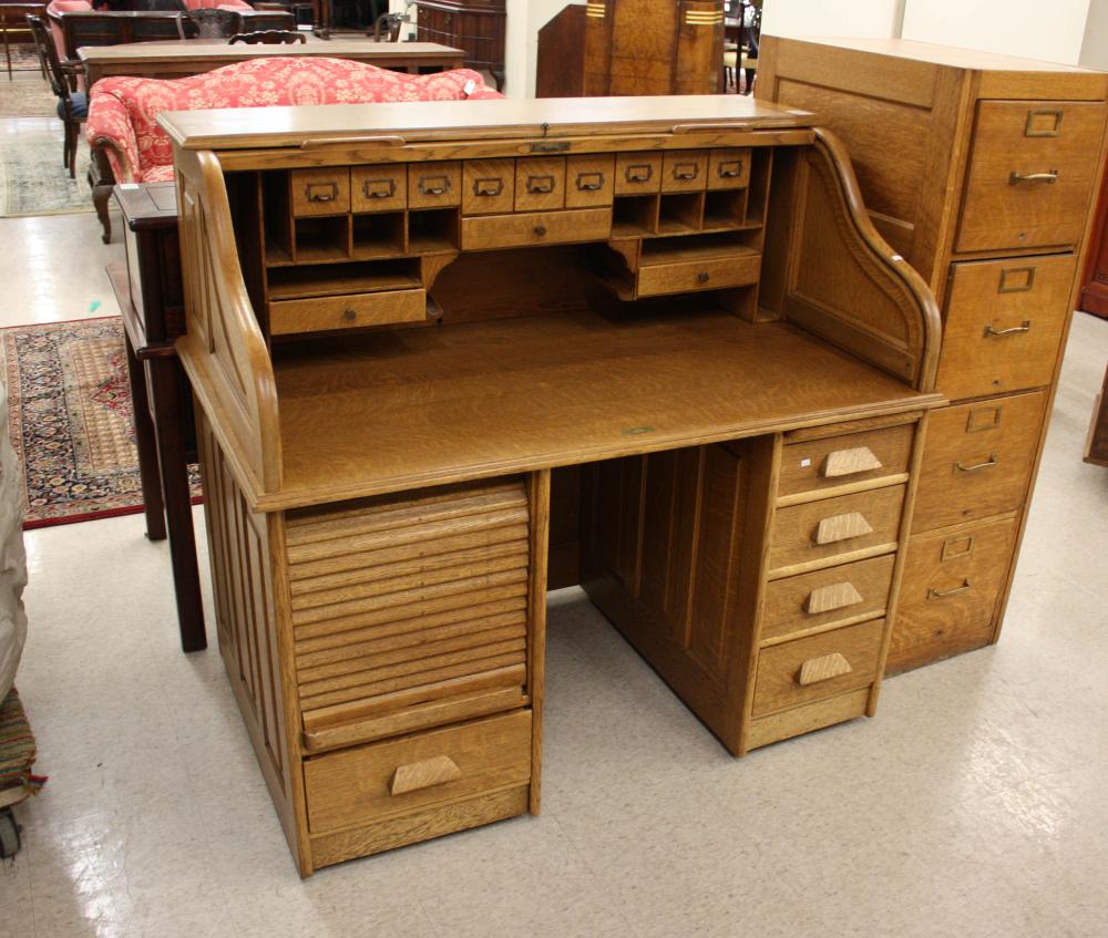 Appraisal: AN OAK ROLL-TOP DESK American c S-roll double pedestal type