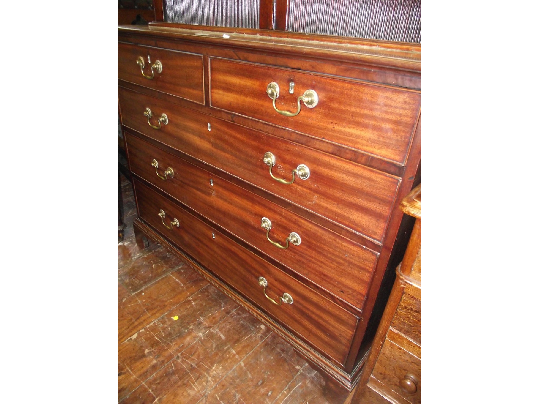 Appraisal: A good quality George III mahogany chest of three long