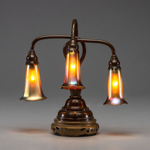 Appraisal: Table Lamp with Quezal ShadesAmerican th Century patinated bronze and