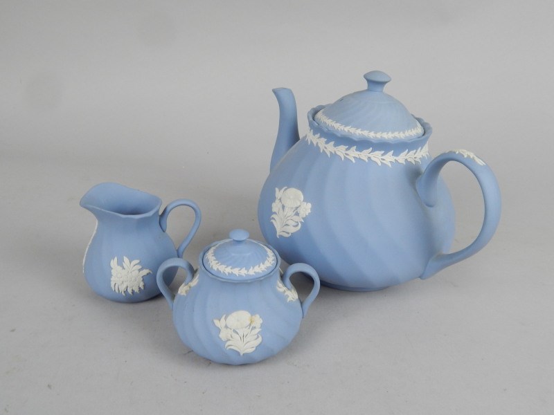 Appraisal: A Wedgwood blue Jasperware tea set three pieces each with