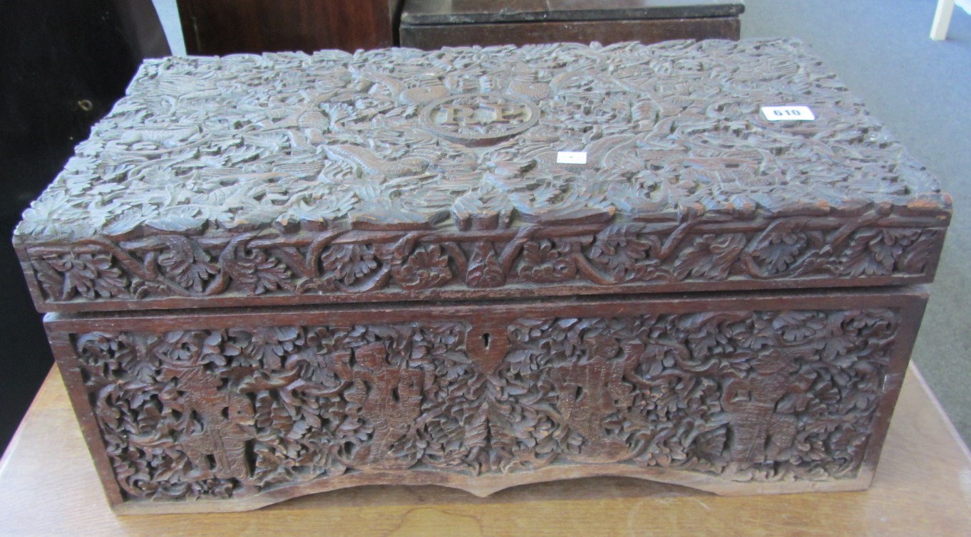 Appraisal: A profusely carved rectangular hardwood box with carved initials R