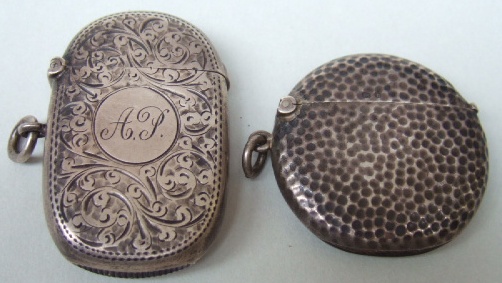 Appraisal: A silver circular vesta case with martele decoration Birmingham and