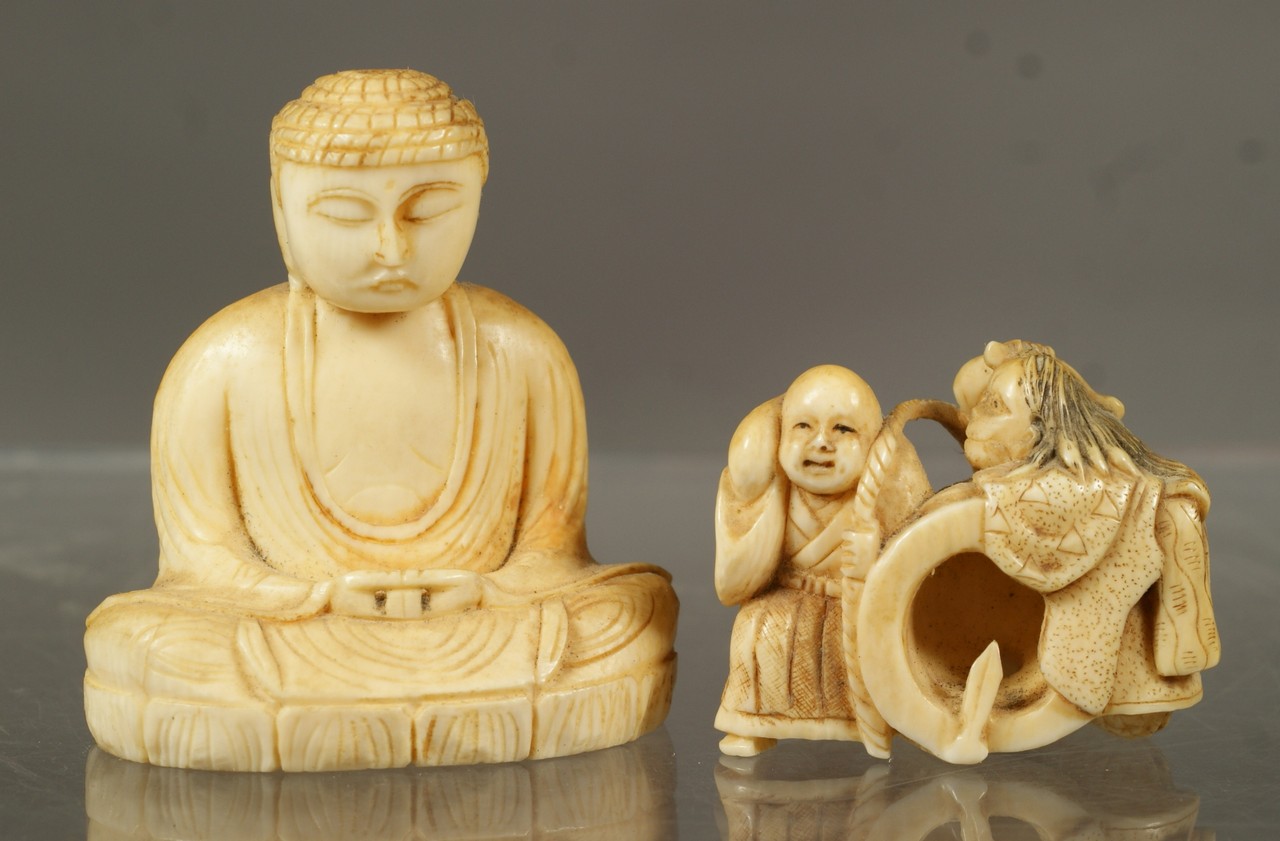 Appraisal: carved ivory netsuke Buddha Sea creature and sailor tallest each