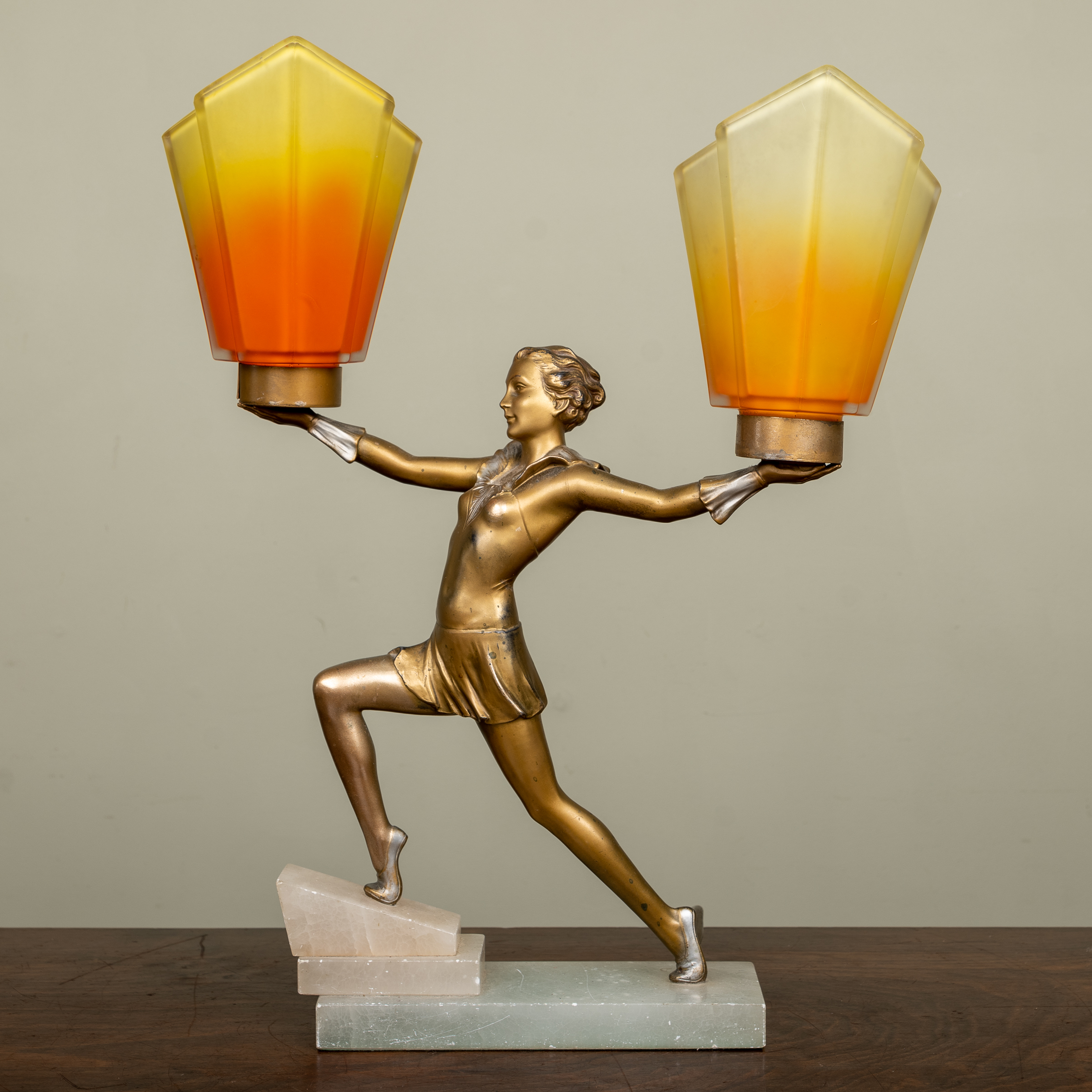 Appraisal: An Art Deco spelter and alabaster table lamp in the